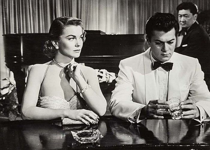 Tony Curtis, Joanne Dru, and Victor Sen Yung in Forbidden