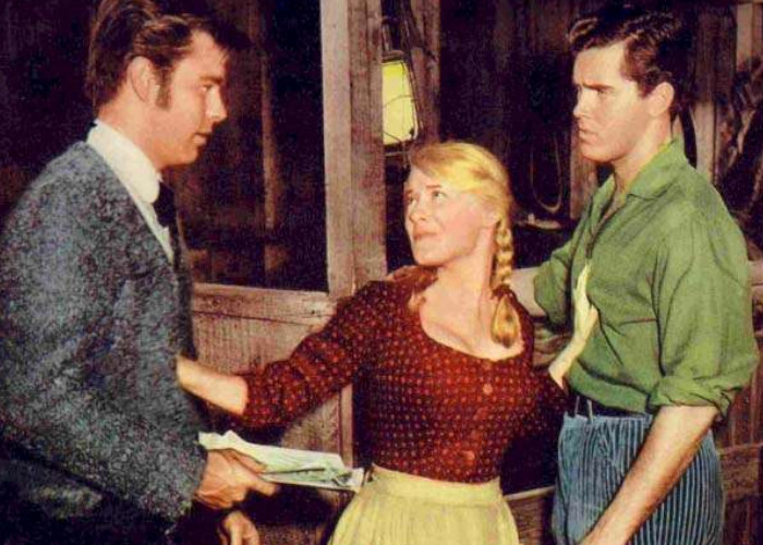 Jeffrey Hunter, Robert Wagner, and Hope Lange in The True Story of Jesse James (1957)