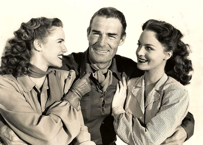 Randolph Scott, Barbara Britton, and Dorothy Hart in Gunfighters (1947)