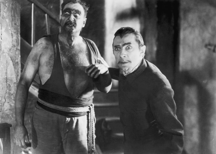 Bela Lugosi and Frederick Peters in White Zombie (1932)