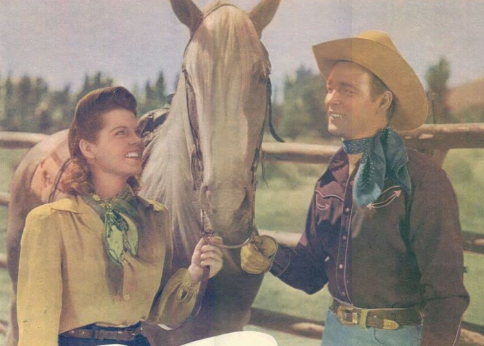 Roy Rogers, Ruth Terry, and Trigger in Hands Across the Border (1944)