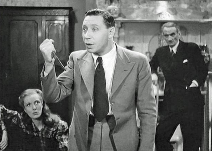 Georgina Cookson, George Formby, and Carl Jaffe in I Didn't Do It (1945)